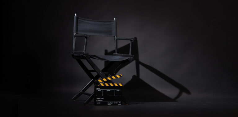 Black director chair and Clapperboard or movie slate use in vide